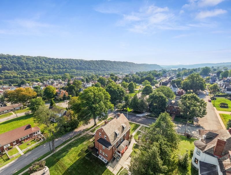 Aerial view over Monongahela and the river valley, 700 Meade Street