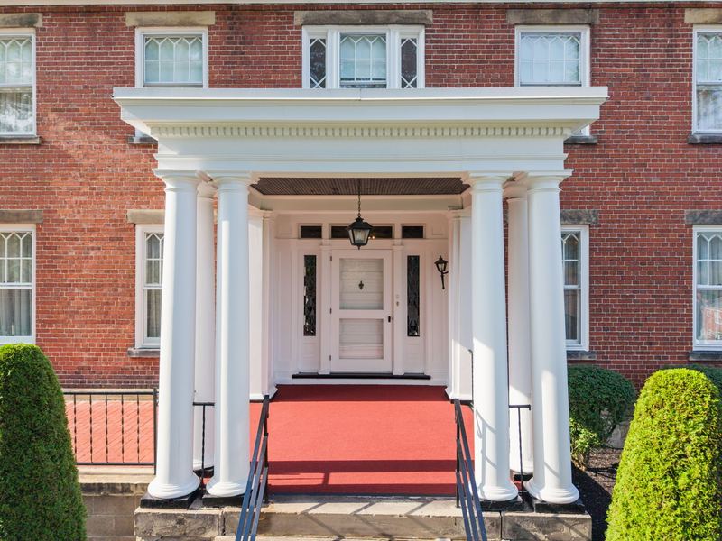 Columned front portico and entry, 700 Meade Street