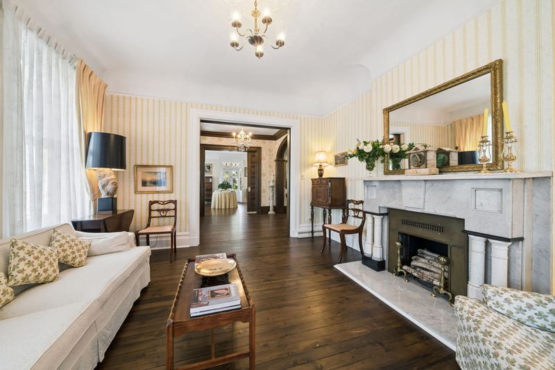 Formal living room with marble mantel