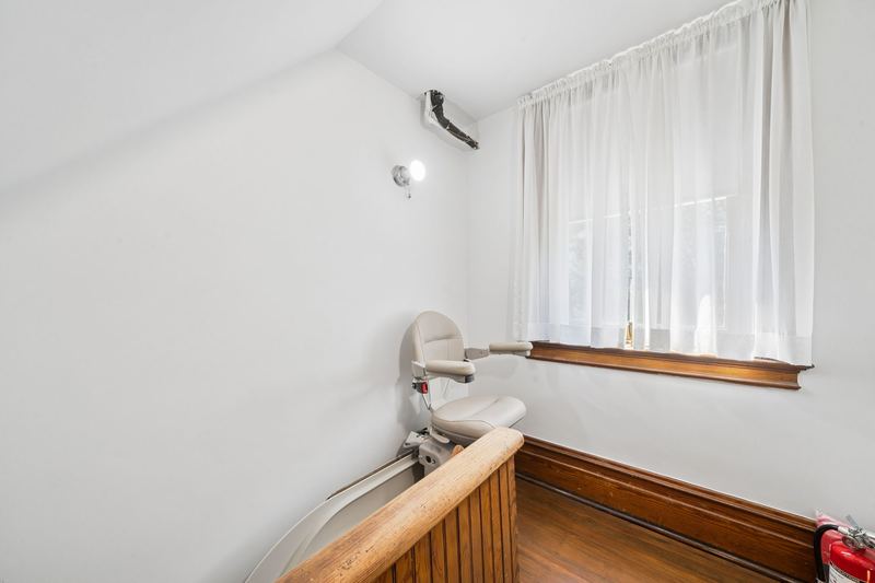 Stairlift on the secondary staircase, 700 Meade Street