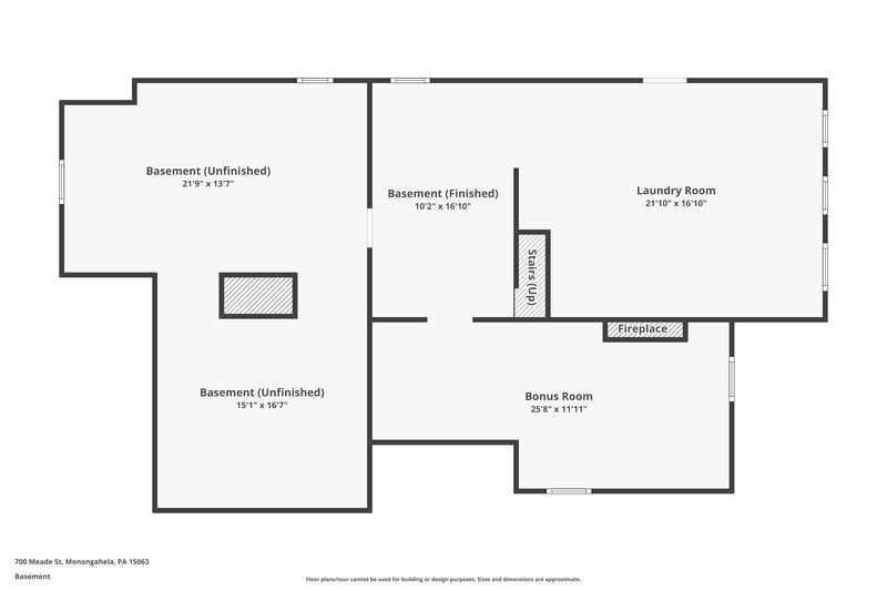 Basement plan: finished bonus room with fireplace, laundry room, and storage